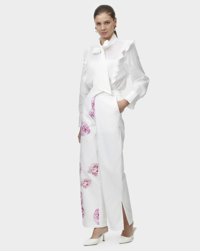 Брюки прямого кроя с эластичной вставкой в поясе и цветочным принтом