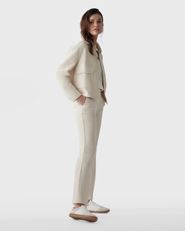 Брюки клеш из фактурного материала на основе хлопка