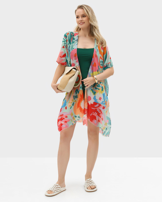 Туника свободного кроя с ярким цветочным принтом и бахромой по низу 4990₽