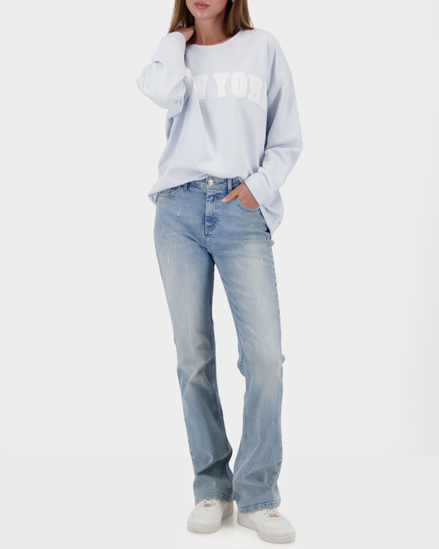 Расклешенные джинсы с мерцающими стразами